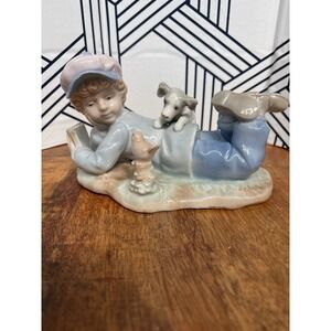 Vintage 1991 Paul Sebastian Porcelain Boy Reading with Dog and Bird Figurine